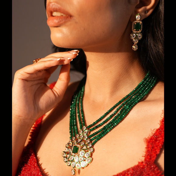 Kundan Pendant and strings of Emerald bead Necklace with Earrings